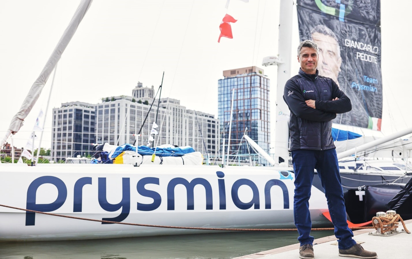 Giancarlo Pedote, Prysmian skipper, pictured with his yacht in NYC.
