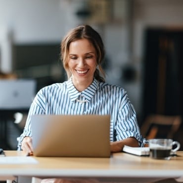 Businesswoman working on laptop
